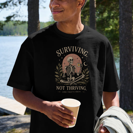 Surviving Not Thriving Skeleton Illustration Unisex T-Shirt | Funny Tired Burned Out Humor Shirt