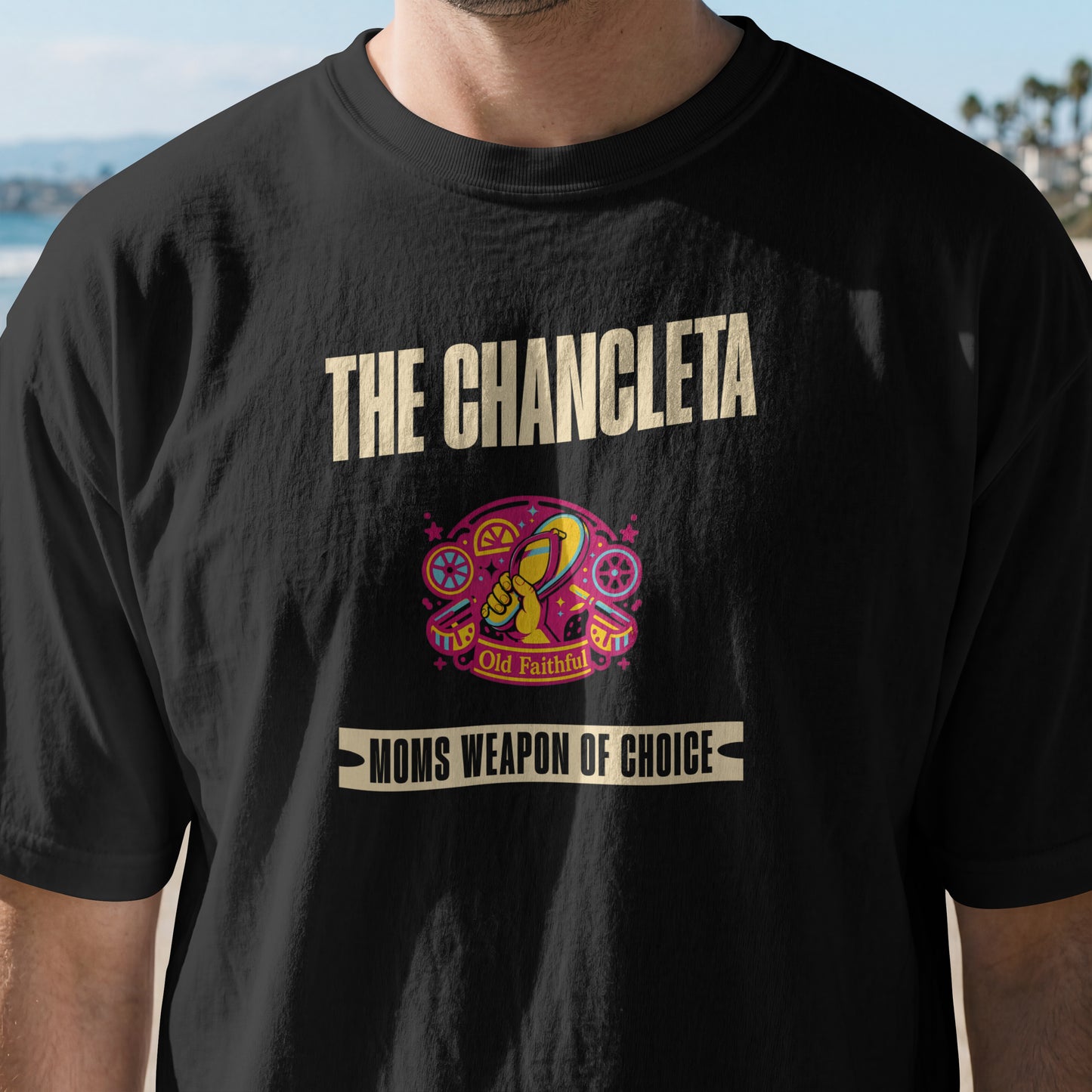 The Chancleta Mom's Weapon Of Choice Unisex T-Shirt | Funny Hispanic Flip Flop Slides Latin Humor Trauma Tee