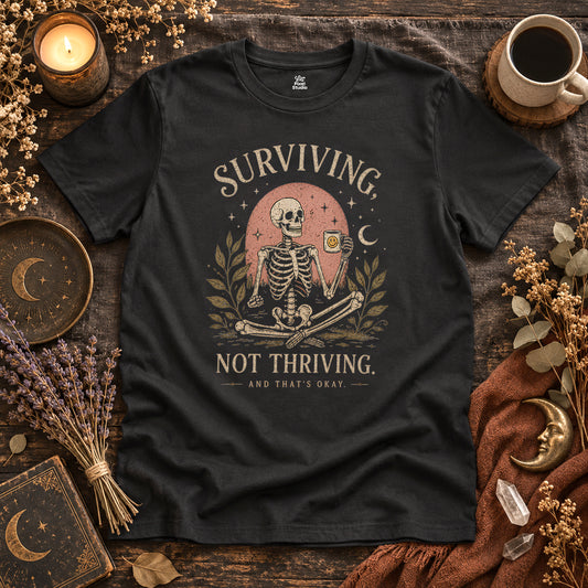 Surviving Not Thriving Skeleton Illustration Unisex T-Shirt | Funny Tired Burned Out Humor Shirt